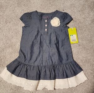 Dress with eyelet hem